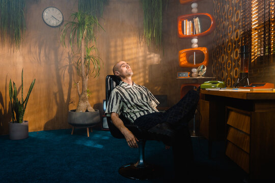Portrait of a man in a retro interior