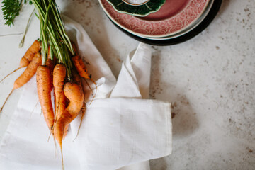 Freshly dug homegrown and irregular carrots