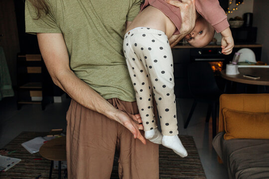 Father and toddler in real moment
