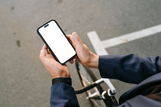 Mobile with a white screen in men's hands