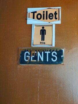 Gents Toilet written on the door of toilet