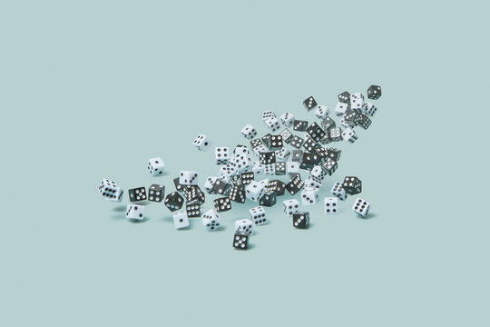 Black and white dice on blue background.