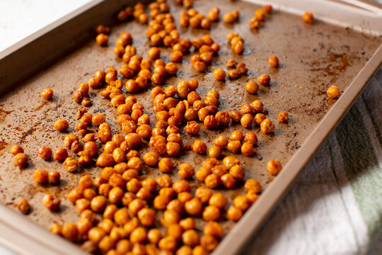 Spiced, roasted chickpeas on a sheet pan