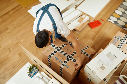 Stacking boxes of personal belongings