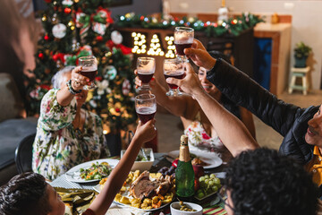 Family at Christmas dinner. 
