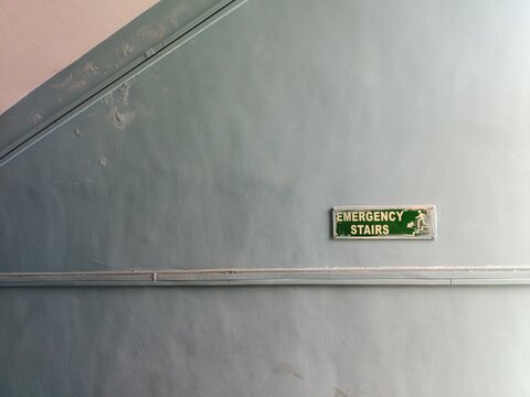 Emergency Stair Written On The Wall Of A Building For Escaping