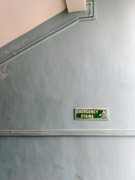 Emergency Stair Written On The Wall Of A Building For Escaping