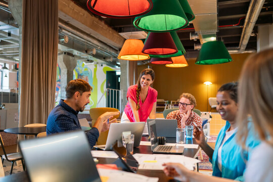 Teamwork At Cozy Office