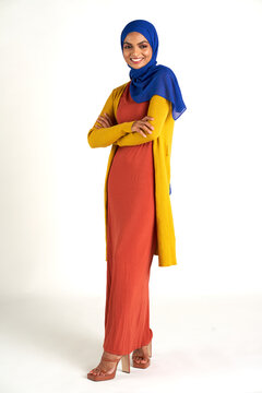 Muslim woman photographed against a seamless backdrop