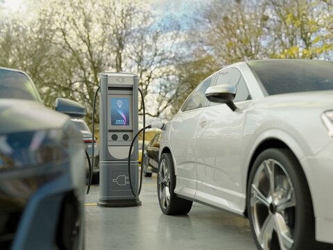Electric vehicles charging at a charging station