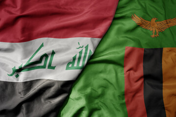 big waving national colorful flag of zambia and national flag of iraq.