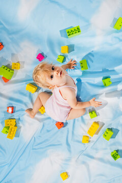 Baby and mess on sky backgorund.