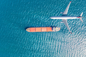 Air Transportation and transit of Container ships loading and unloading, Business logistic import-export transport sea freight with copy space.