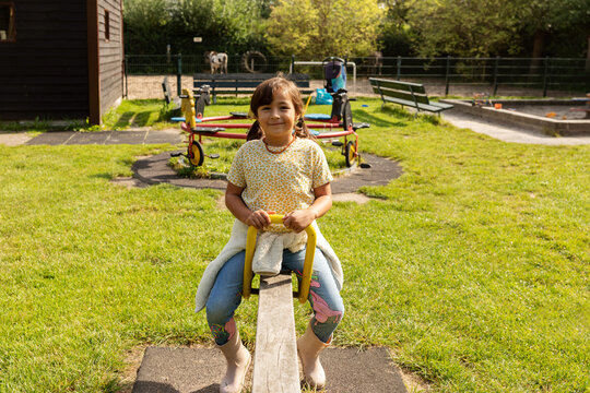 girl at seesaw 