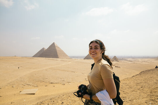 Female photographer at the pyramids of Egypt