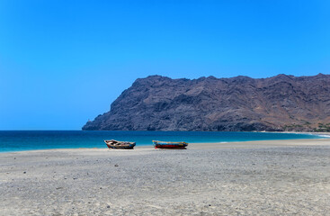 Fototapeta na wymiar Fishing boats on the beach, Praia de Sao Pedro, Island Sao Vicente, Cape Verde, Cabo Verde, Africa.