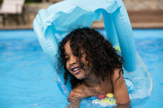 Girl in the swimming pool