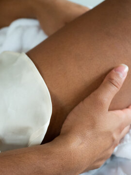 Closeup Hand on Leg