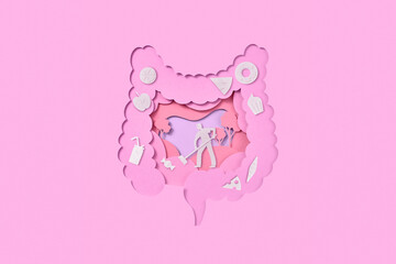 Papercraft cleaner sweeping fast food in digestive system