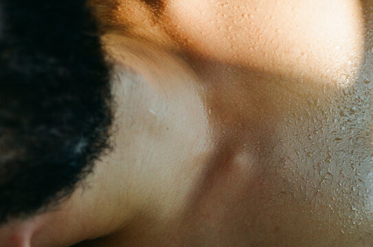 Man's body part with drops of sweat from the heat