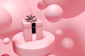 Pink Christmas gift box surrounded by pink balls