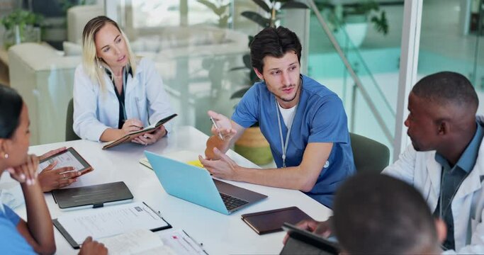 Medical, team and discussion for healthcare in conference room with technology, documents and top view. Collaboration, doctor and nurse group in boardroom for surgery brainstorming and health meeting