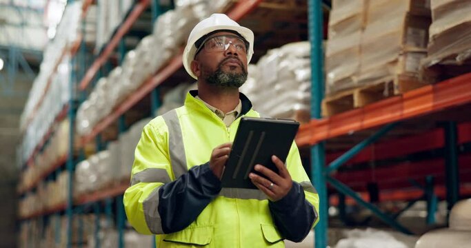 Black man, inventory and inspection with tablet for supply chain, logistics or quality assurance at warehouse. African male person or storage manager with technology for stock, checklist or shipping