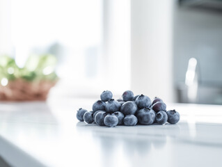 bundle of blueberries on a white kitchen counter, depth of field, sunlit interior room