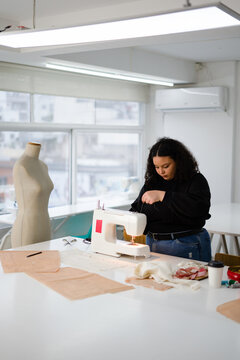 Designer Holding A thread 