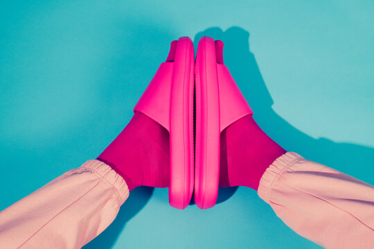 man wearing pink socks and sandals
