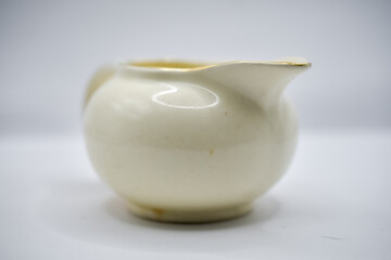 Small milk jug with gold rim