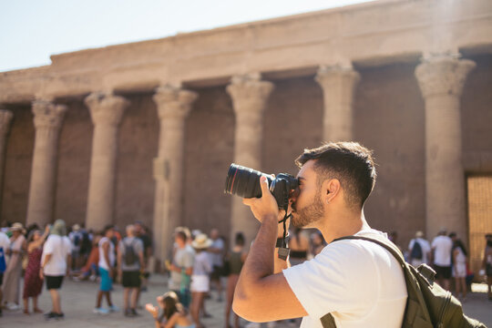 Photographer taking pictures at the Edfu Temple.