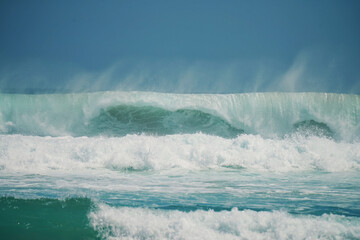 wave breaking on the shore