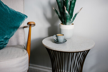 Still life of coffee and plant