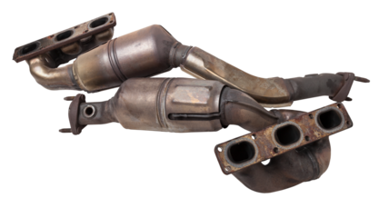 Automotive catalyst removed from a vehicle for repair with a ceramic coating inside as part of an exhaust system to remove harmful emissions in a car repair shop