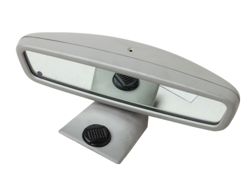 Close-up on a rear view mirror from a sedan for repair and replacement after an accident in a workshop. Auto service industry. Spare parts catalog.