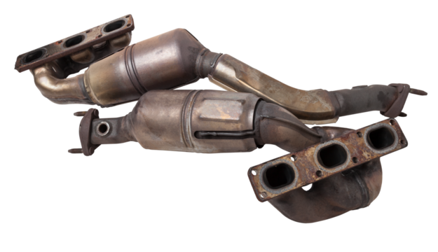 Automotive catalyst removed from a vehicle for repair with a ceramic coating inside as part of an exhaust system to remove harmful emissions in a car repair shop