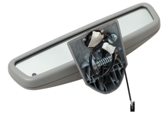 Close-up on a rear view mirror from a sedan for repair and replacement after an accident in a workshop. Auto service industry. Spare parts catalog.