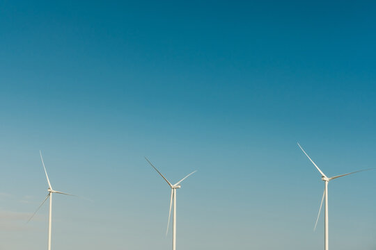 Wind turbines on a blue sky 