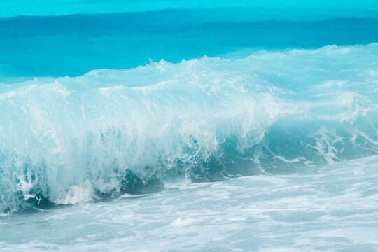Amazing turquoise sea water and wave splash foam