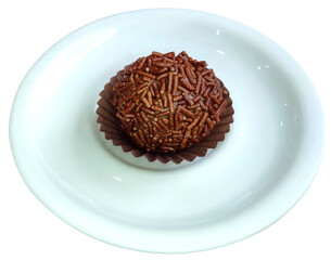 Traditional Brazilian sweet known as brigadeiro or Brazilian truffle on the porcelain pyrex.
