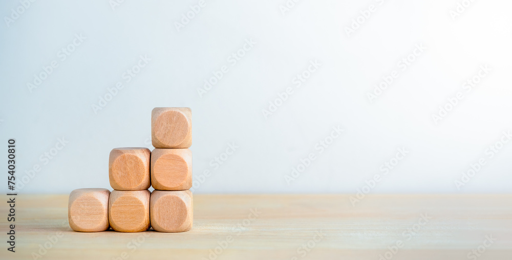 Poster clean wooden cube blocks stack as business chart steps isolated on wood desk, white background with 