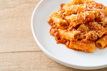 Rigatoni pasta bolognese with cheese