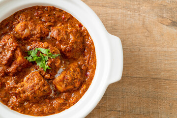 chicken tikka masala spicy curry meat food with roti or naan bread