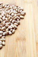 Brazil map with carioca beans Brazilian grains on the cutting board.