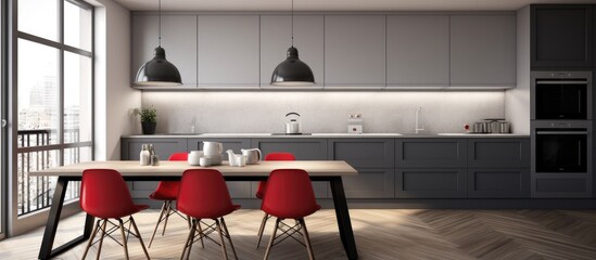 A minimalistic modern kitchen featuring a table surrounded by bright red chairs on a sleek parquet floor. The clean design of the kitchen exudes a contemporary aesthetic.
