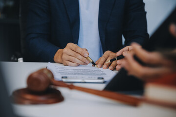 Consultation and conference of Male lawyers and professional businesswoman working and discussion...