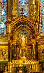 Fototapeta na wymiar Mary Statue Altar Stained Glass Basilica Notre Dame Lyon France