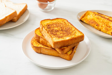 french toast on white plate