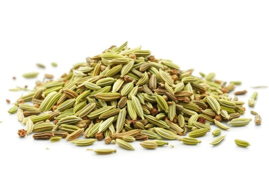 A pile of Fennel Seeds with a white background. The seeds are green and brown. The pile is small and scattered